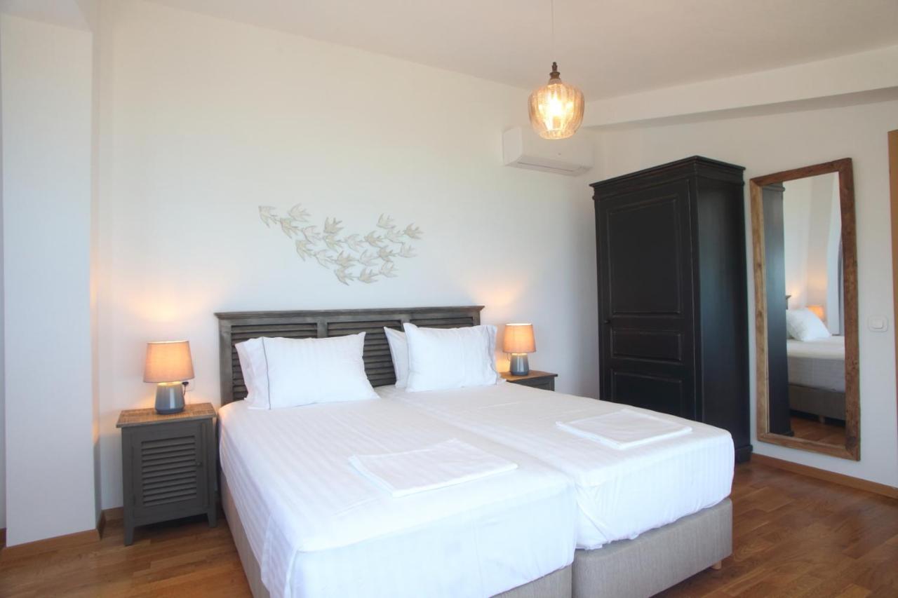 Capro - Milos Bay Villas Ayios Nikitas Bagian luar foto